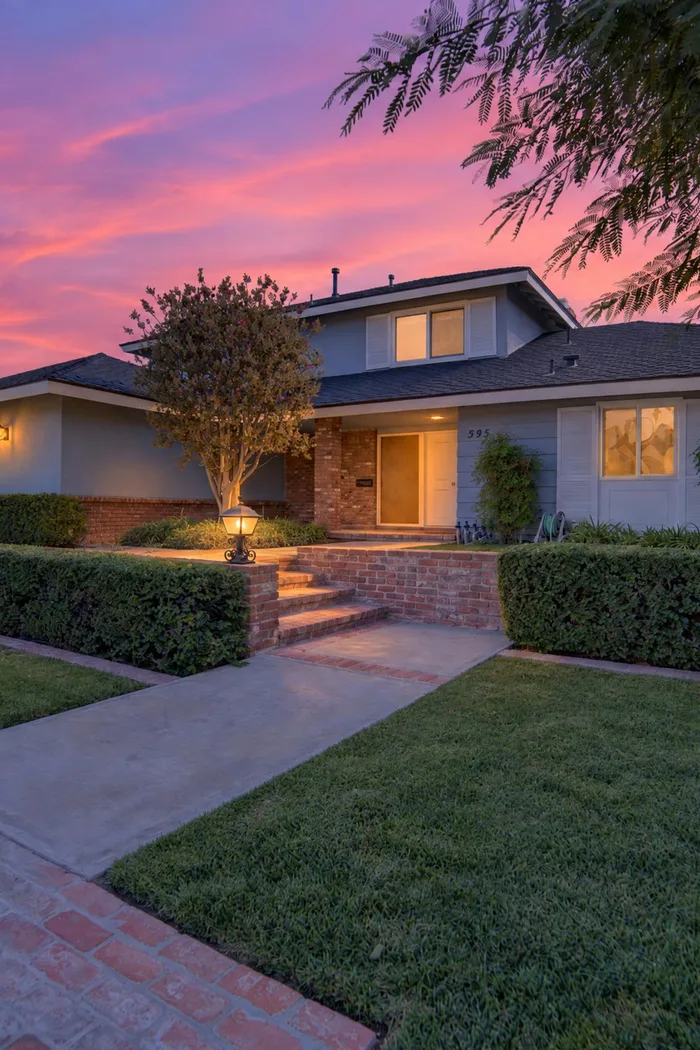 Residential listing exterior at twilight — real estate photography by Hunter Cannon